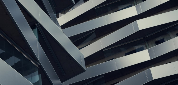 low-angle-photography-of-gray-building-at-daytime.jpg low angle photography of gray building at daytime